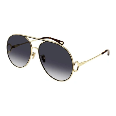 Shop Chloé Sunglasses In Gold