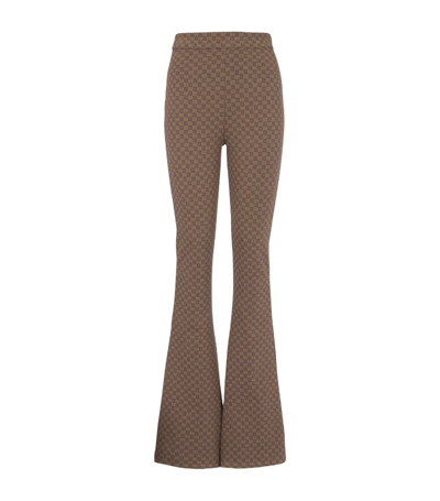 Shop Balmain Mini Monogram Flared Trousers In Brown