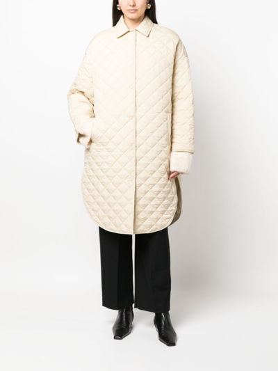 Shop Totême Quilted Coat In White