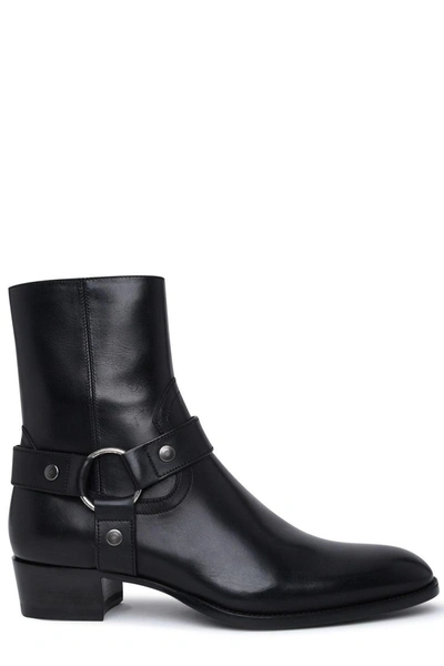 Shop Saint Laurent Wyatt Harness Boots In Default Title