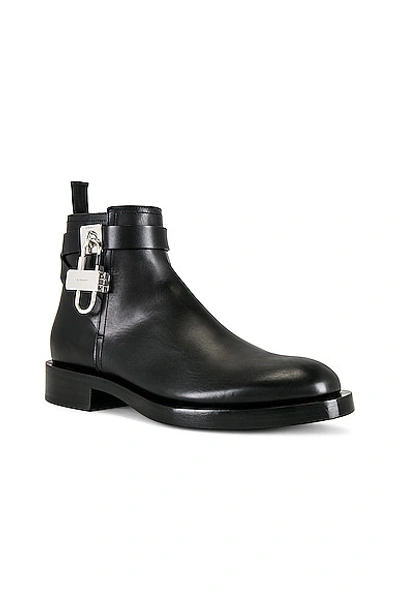 Shop Givenchy Lock Ankle Boot In Black