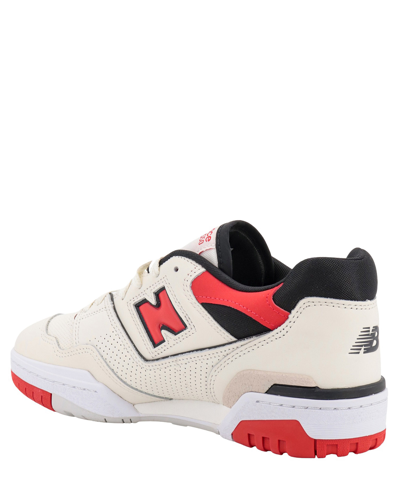 Shop New Balance 550 Sneakers In White