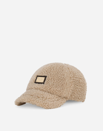 Shop Dolce & Gabbana Faux Fur Baseball Cap With Logo Tag In Beige