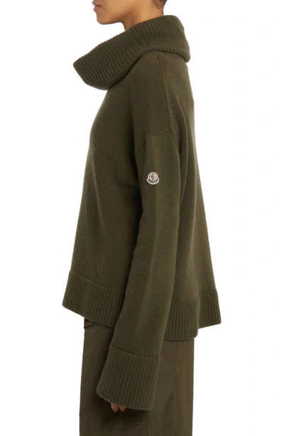 Shop Moncler Split Cuff Oversize Wool Sweater In Green