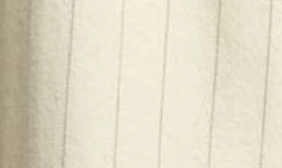 Shop Zimmermann Luminosity Pinstripe Wool & Cotton Pleated Pants In Cream Stripe