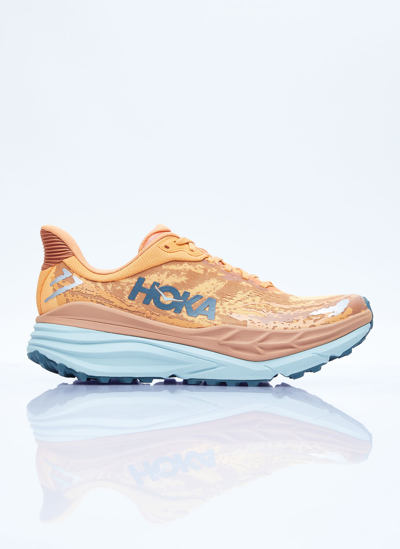 Shop Hoka Stinson 7 Sneakers In Orange