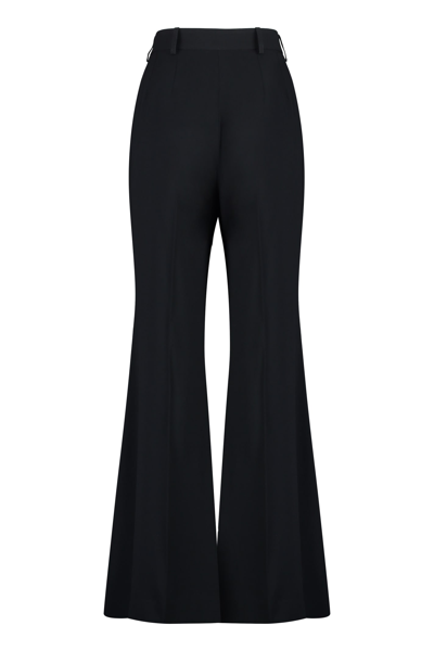 Shop Nina Ricci Flared Trousers In Black