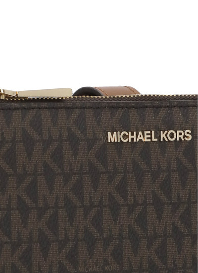 Shop Michael Michael Kors Jet Set Wallet In Brown