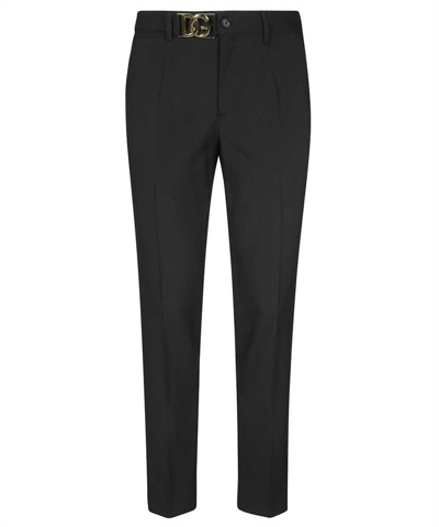 Shop Dolce & Gabbana Logo-buckle Tapered Trousers In Black