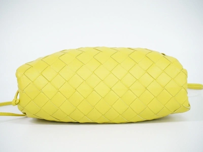 Shop Bottega Veneta Mini Pouch Yellow Leather Clutch Bag ()