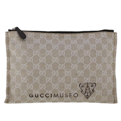 Shop Gucci Gg Canvas Grey Canvas Clutch Bag ()