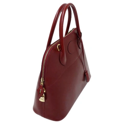 Shop Hermes Hermès Bolide Burgundy Leather Handbag ()