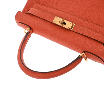 Shop Hermes Hermès Kelly Orange Leather Handbag ()