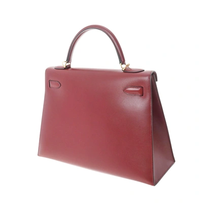 Kelly dépêches leather handbag Hermès Red in Leather - 34118072