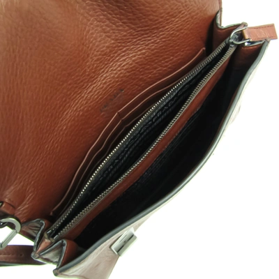 Shop Prada Brown Pony-style Calfskin Clutch Bag ()