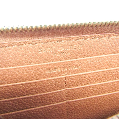 Shop Saint Laurent Orange Leather Wallet  ()
