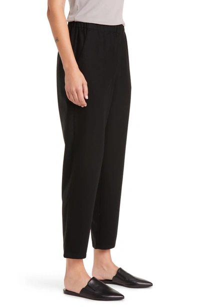 Shop Eileen Fisher Wool Tapered Ankle Pants In Black