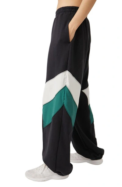 Shop Fp Movement By Free People Hot Chevron Colorblock Cotton Blend Track Pants In Black Combo