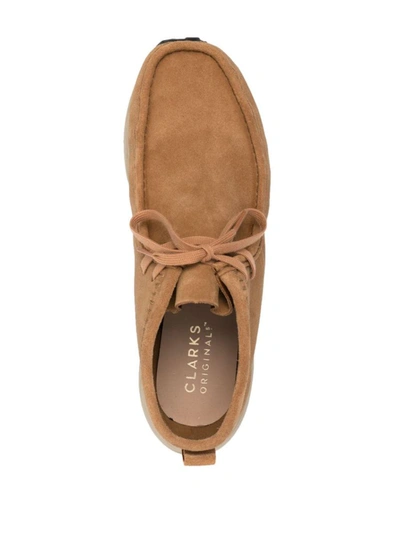 Shop Clarks Wallabee Suede Leather Shoes In Beige