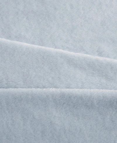 Shop Kenneth Cole Solid Ultra Soft Plush Blanket In Light Blue