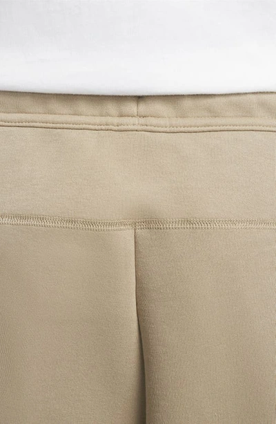 Shop Nike Tech Fleece Open Hem Pants In Khaki/ Black
