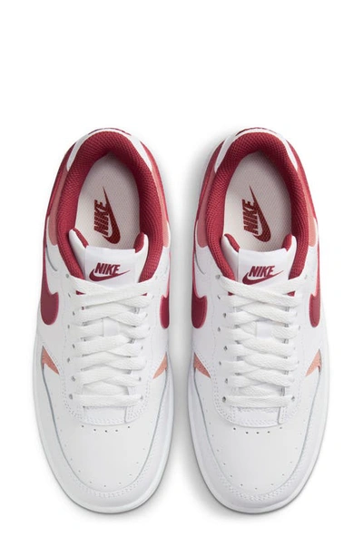 Shop Nike Gamma Force Sneaker In White/ Cedar