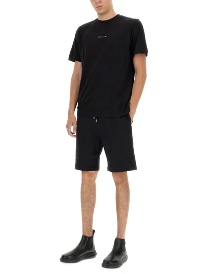 Shop Alyx 1017  9sm "visual" Bermuda Shorts Unisex In Black