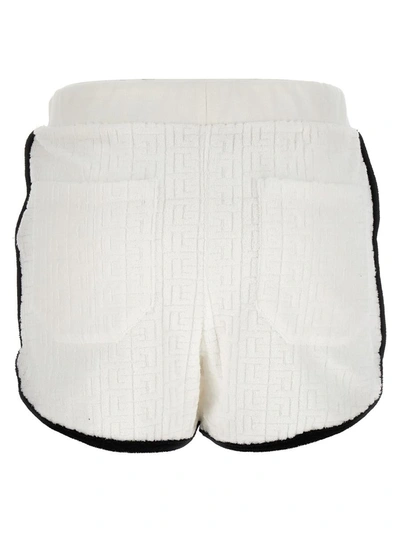 Shop Balmain 'monogram' Shorts In White/black