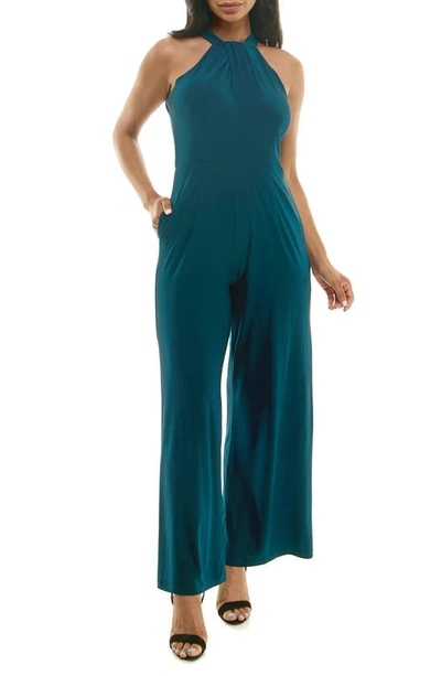 Shop Nina Leonard Twist Halter Knit Jumpsuit In Radiant Teal