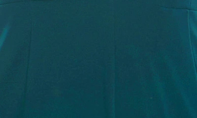 Nina Leonard Twist Halter Knit Jumpsuit In Radiant Teal