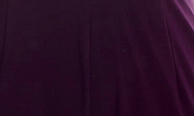 Nina Leonard Twist Halter Knit Jumpsuit In Black Plum