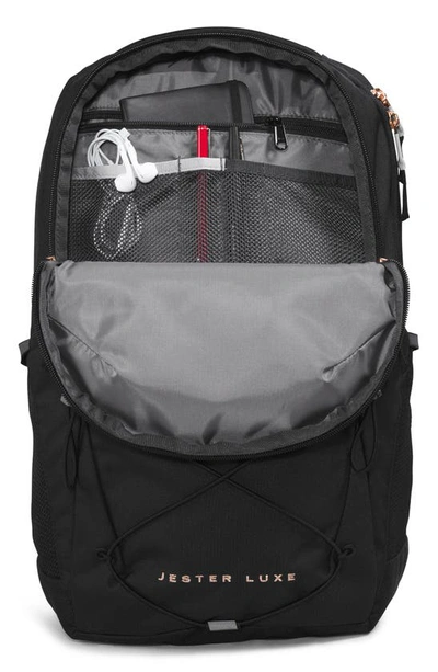 Shop The North Face Jester Luxe Backpack In Tnf Black/ Coral Metallic