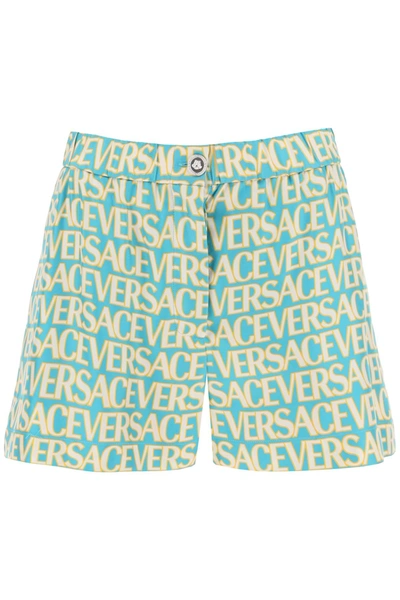 Shop Versace Monogram Print Silk Shorts In Turquoise Avory (light Blue)