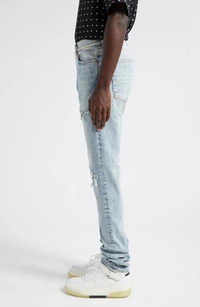 Shop Amiri Mx1 Distressed Jeans In Stone Indigo