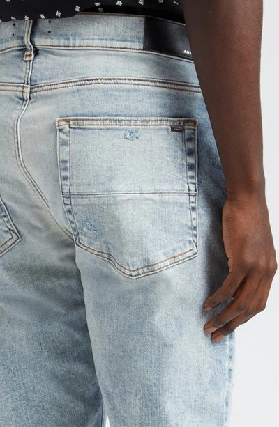 Shop Amiri Mx1 Distressed Jeans In Stone Indigo