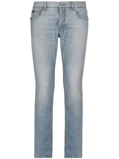 Shop Dolce & Gabbana Slim Jeans With Logo Plaque In Blue
