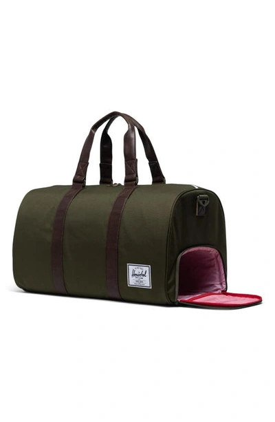 Shop Herschel Supply Co Novel Duffle Bag In Ivy Green/ Chicory Coffee