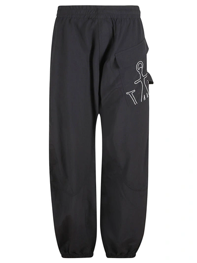 Shop Jw Anderson J.w. Anderson Twisted Track Pants In Black