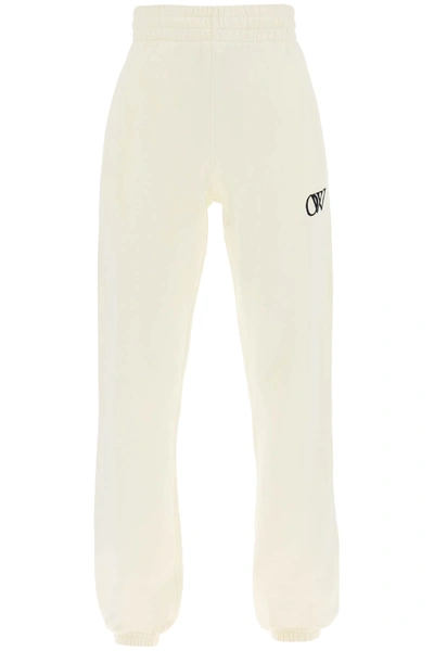 Shop Off-white Joggers With Flocked Logo In Beige Black (white)