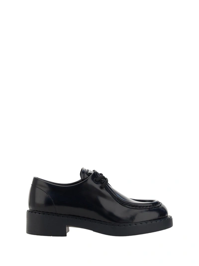 Shop Prada Chocolate Loafers In Default Title