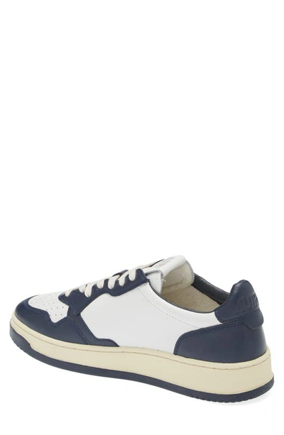 Shop Autry Medalist Low Sneaker In Wht/blue