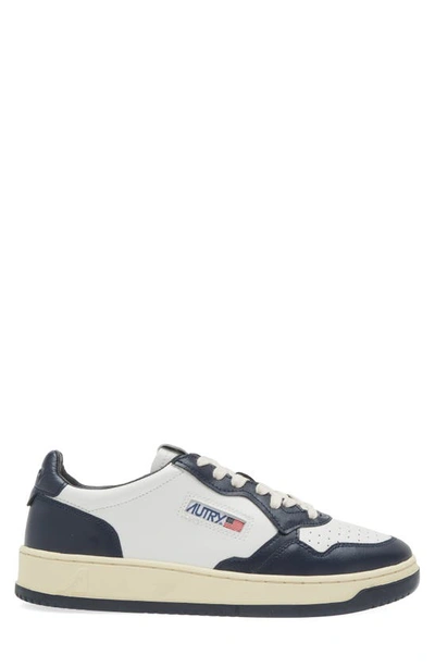 Shop Autry Medalist Low Sneaker In Wht/blue