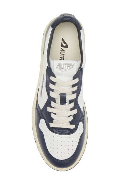 Shop Autry Medalist Low Sneaker In Wht/blue