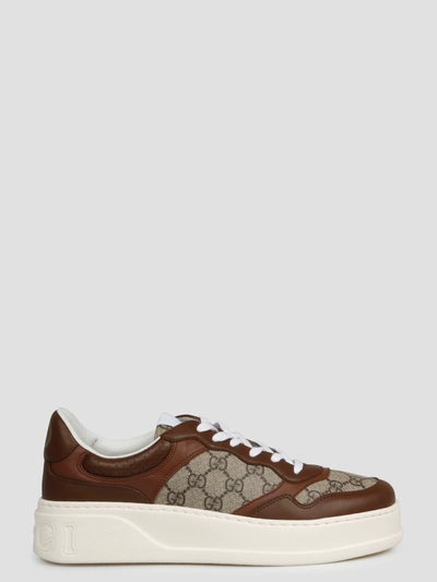 Shop Gucci Gg Trainer In Brown