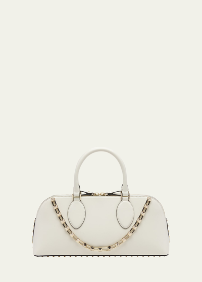 Shop Valentino Rockstud Glossy Leather Top-handle Bag In Ivory
