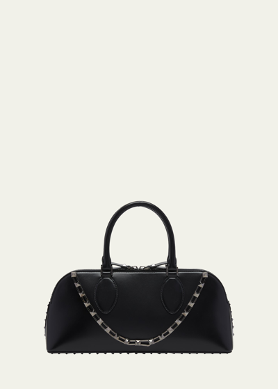 Shop Valentino Rockstud Glossy Leather Top-handle Bag In Nero