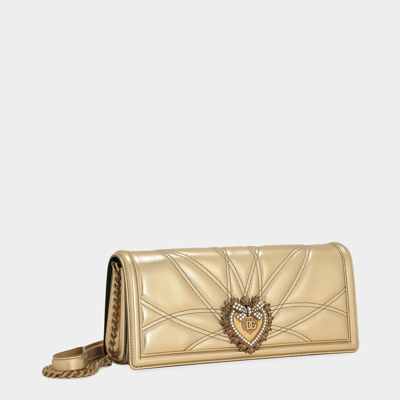 Shop Dolce & Gabbana Devotion Baguette Bag In Gold