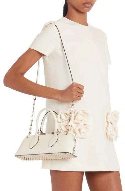 Shop Valentino Rockstud Leather East/west Duffle Bag In 098 Ivory