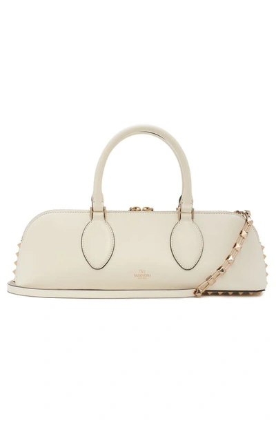 Shop Valentino Rockstud Leather East/west Duffle Bag In 098 Ivory