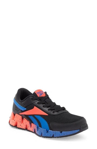 Shop Reebok Kids' Zig Dynamica 2.0 Athletic Sneaker In Black/ Electric Blue